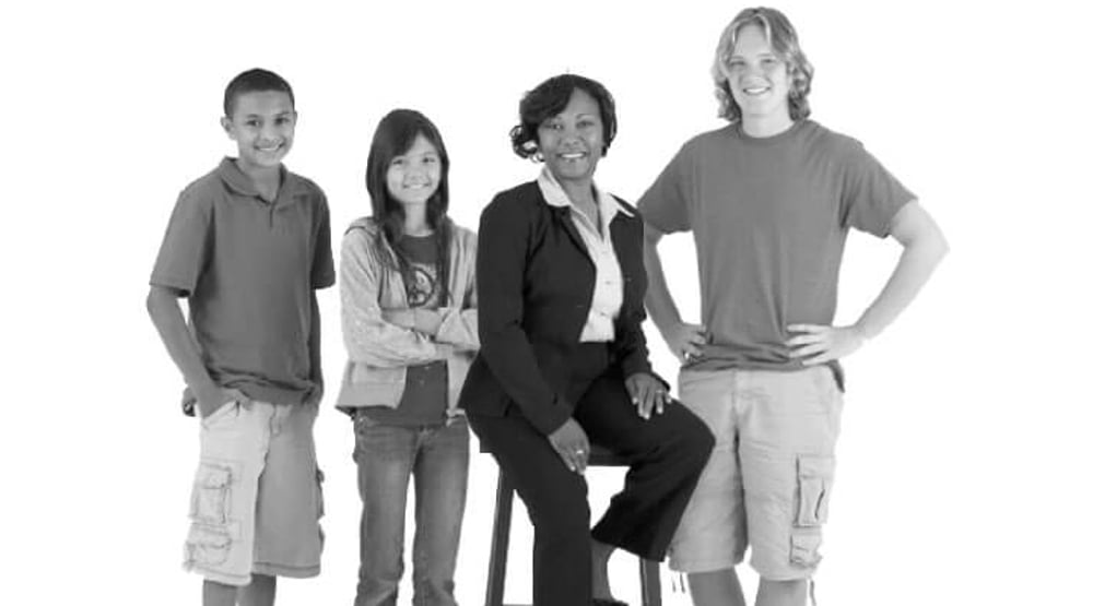 A Junior Achievement administrator with three K-12 children.