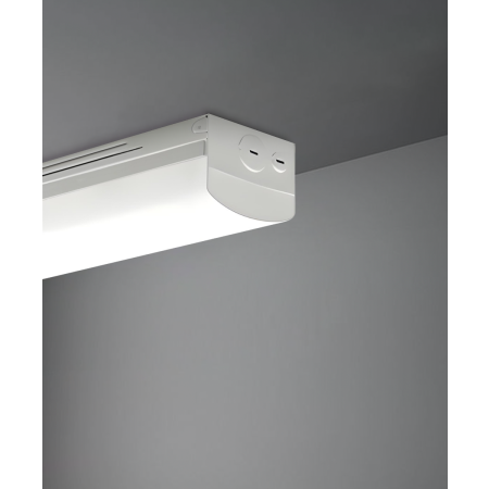 Alcon 11163-S, surface linear ceiling light shown in silver finish and with a wrapping ribbed lens.