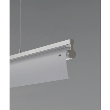 Alcon 12160-P-WW, suspended linear pendant light shown in silver finish, with a rotating cylindrical half-lite lens, and a curved silver wall washing lens cap.