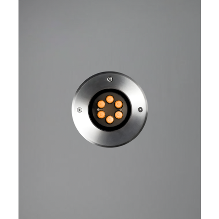 The 14127-6 in-ground well light by Alcon Lighting with a clear, 6-inch shatterproof lens shown with a stainless steel finish